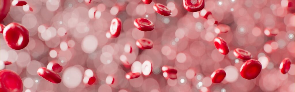 a bunch of red bubbles floating in the air