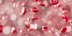 a bunch of red bubbles floating in the air