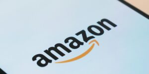black Samsung Galaxy smartphone displaying Amazon logo