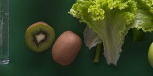 assorted fruits and vegetables on green surface