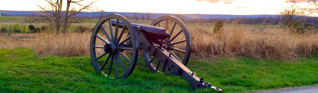 a cannon on a grassy field