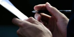 a close up of a person holding a cell phone